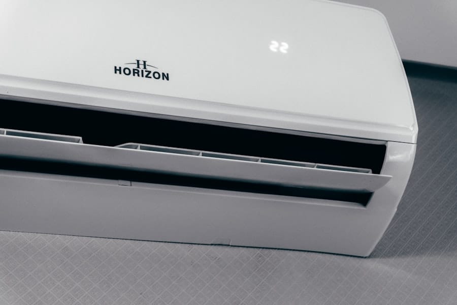 A wall-mounted air conditioning unit with its vent open